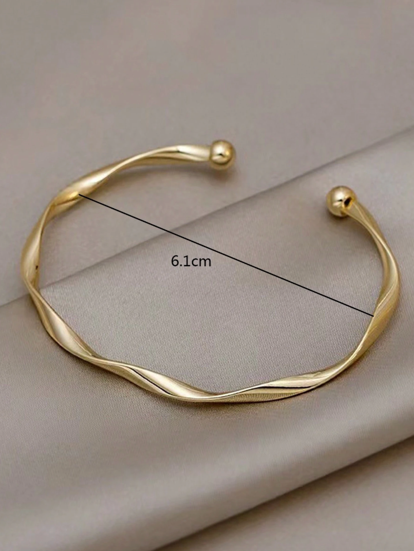 Twist metalic cuff bangle